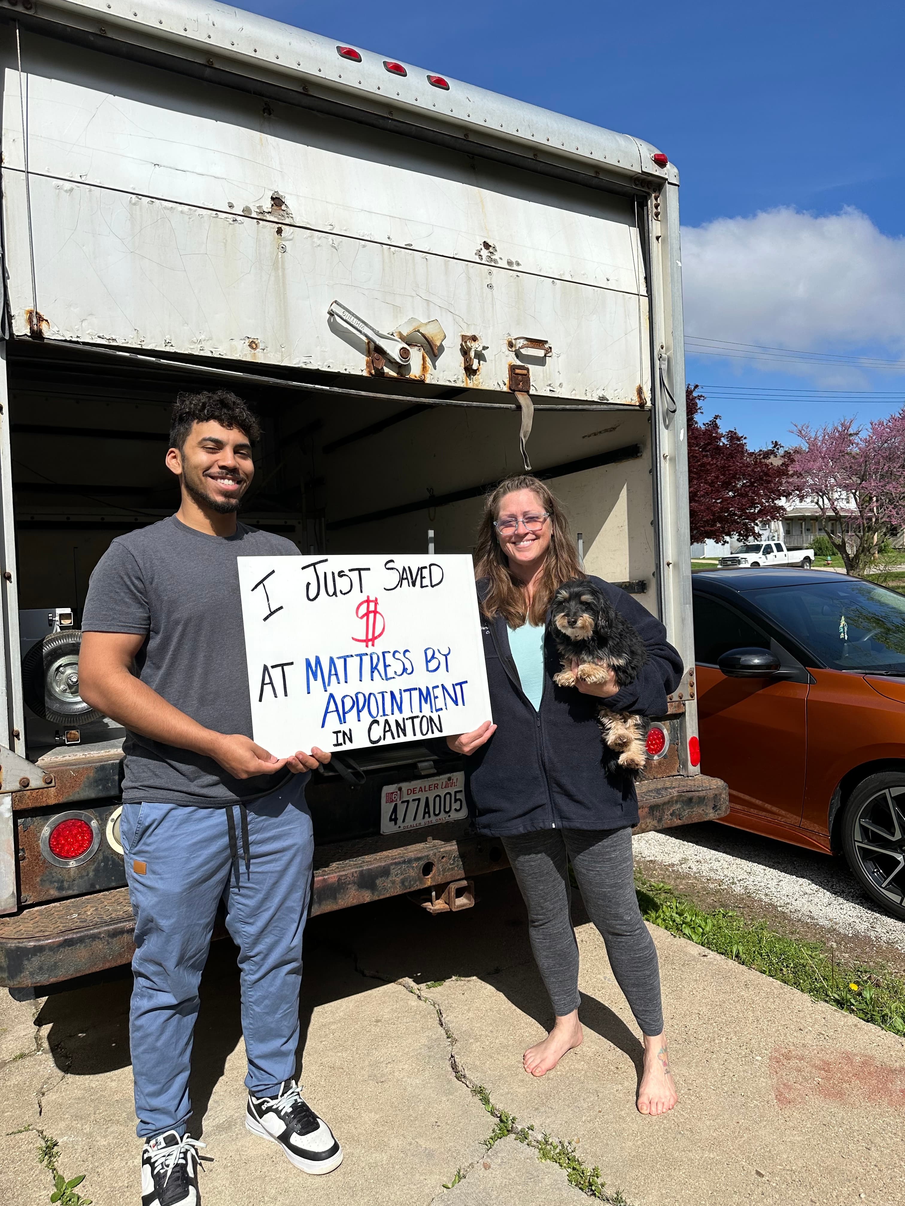 Happy customer with a new mattress from Mattress by Appointment Canton