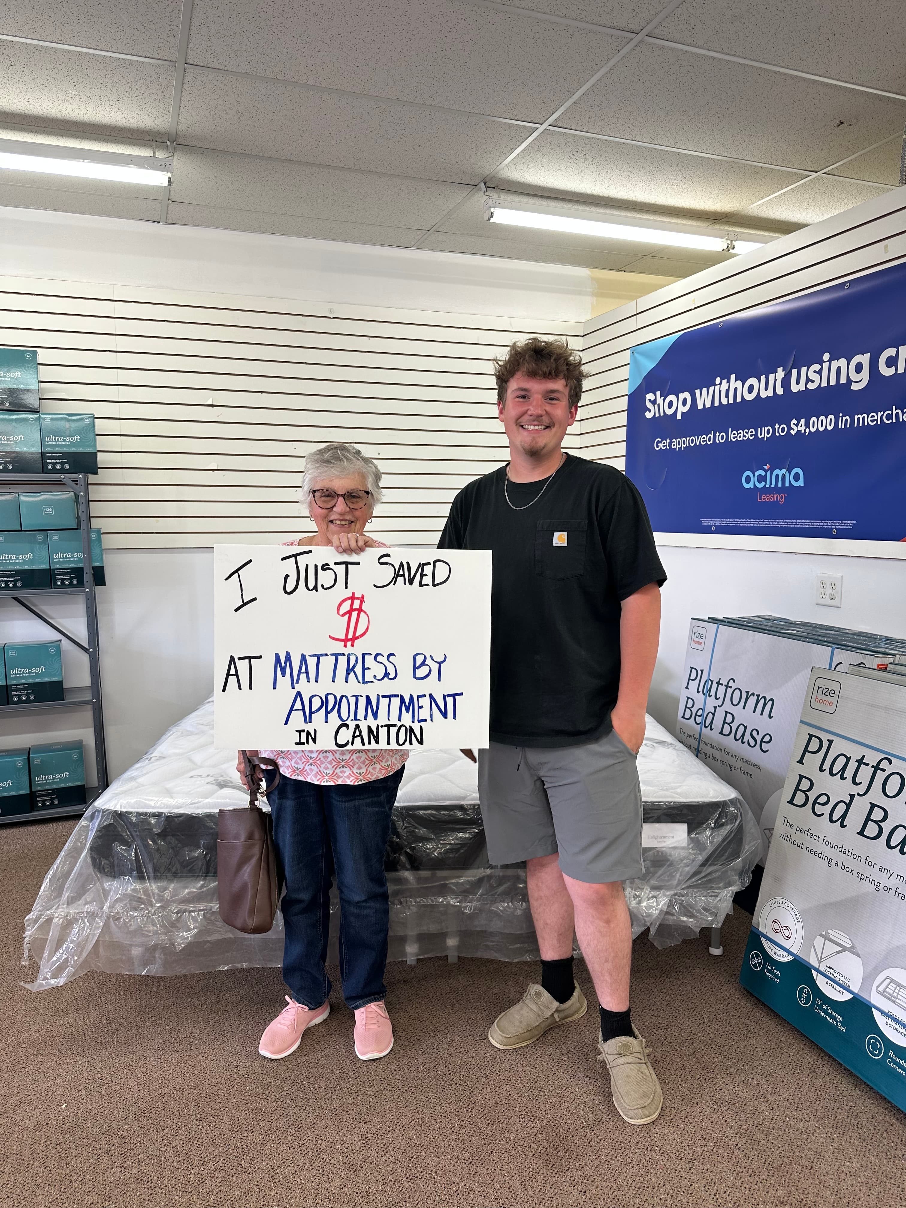 Happy customer with a new mattress from Mattress by Appointment Canton