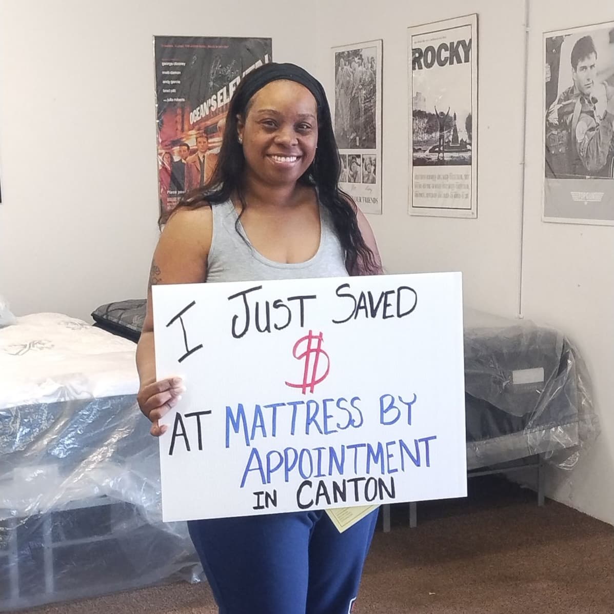 Happy customer with a new mattress from Mattress by Appointment Canton