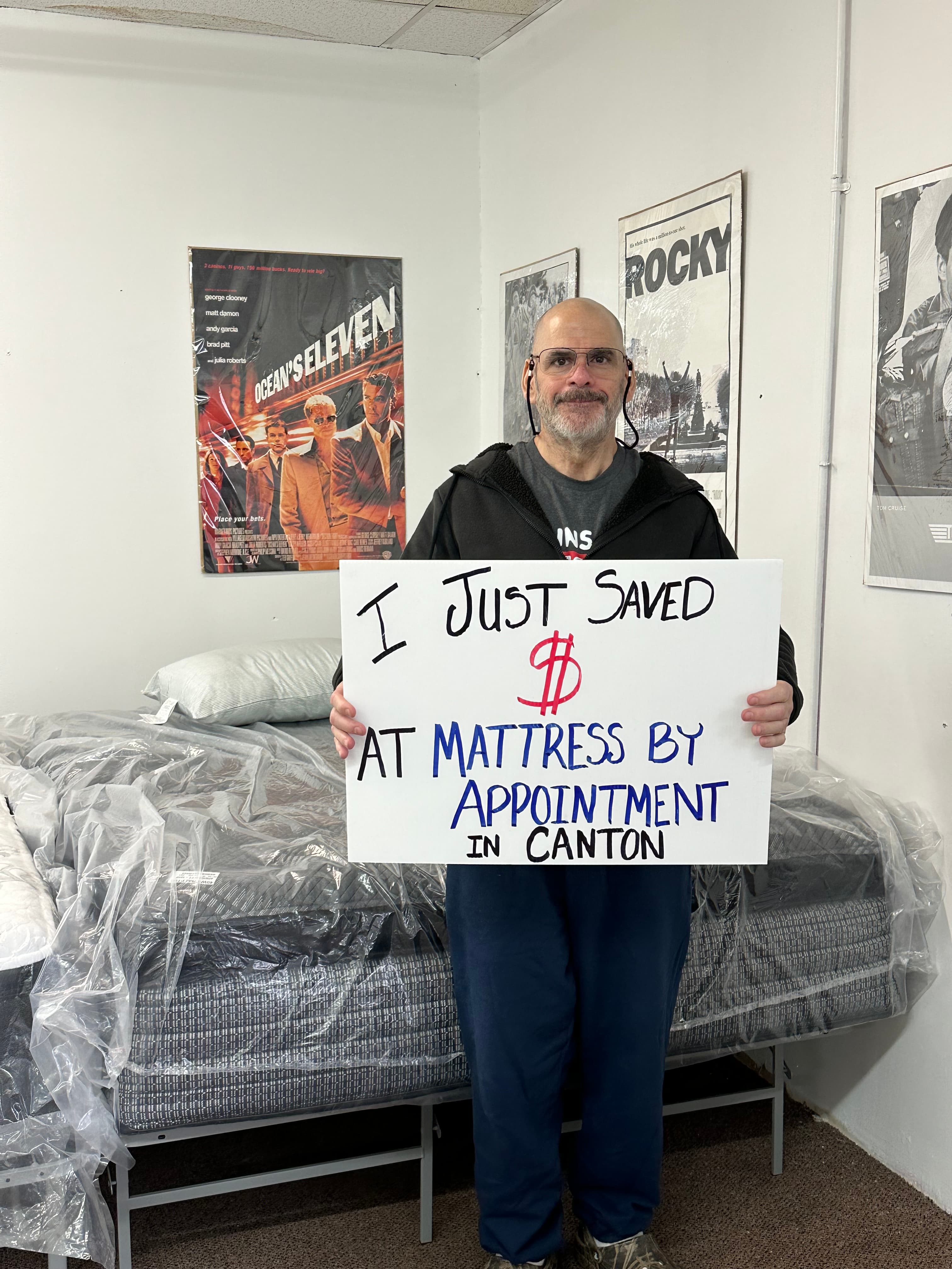 Happy customer with a new mattress from Mattress by Appointment Canton