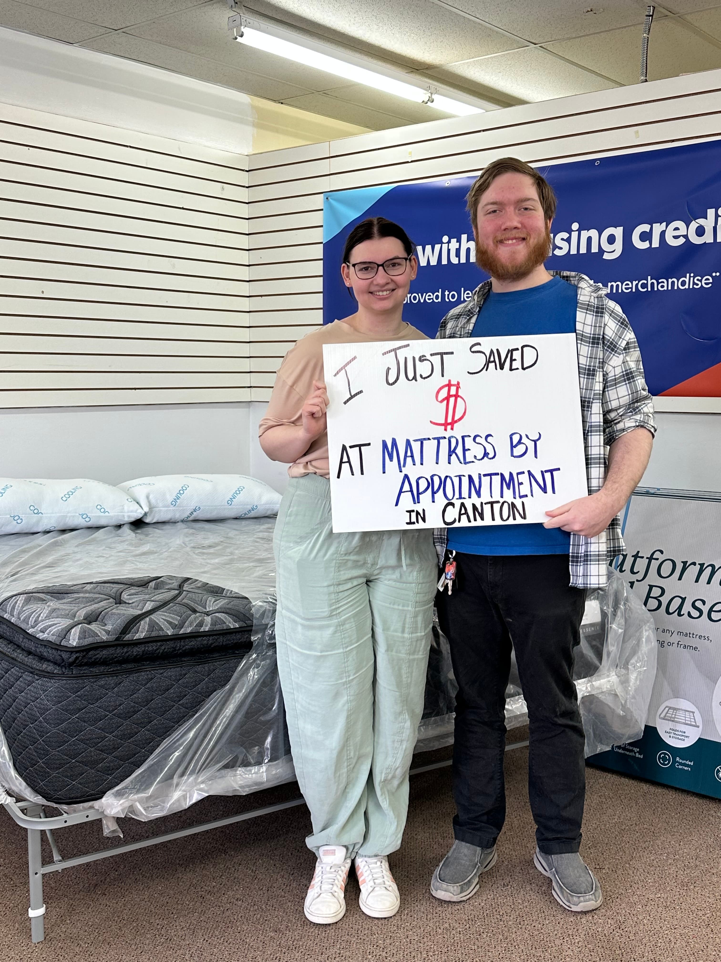 Happy customer with a new mattress from Mattress by Appointment Canton